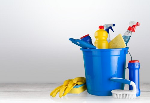 Team checking cleaning equipment and workplace hazards